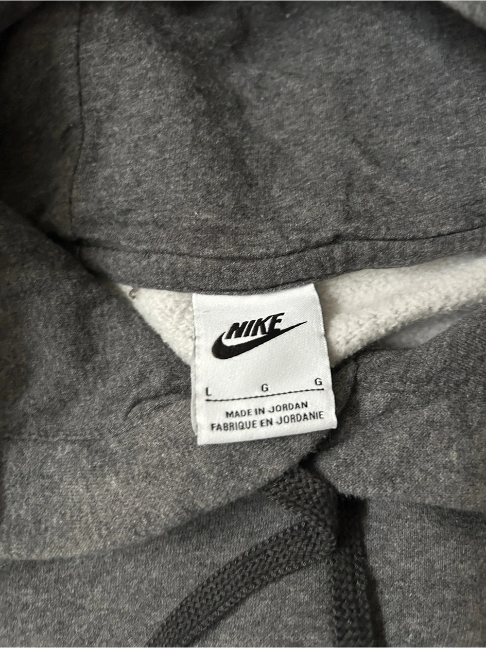 Nike Gray Hoodie with White Tag and Black Swoosh